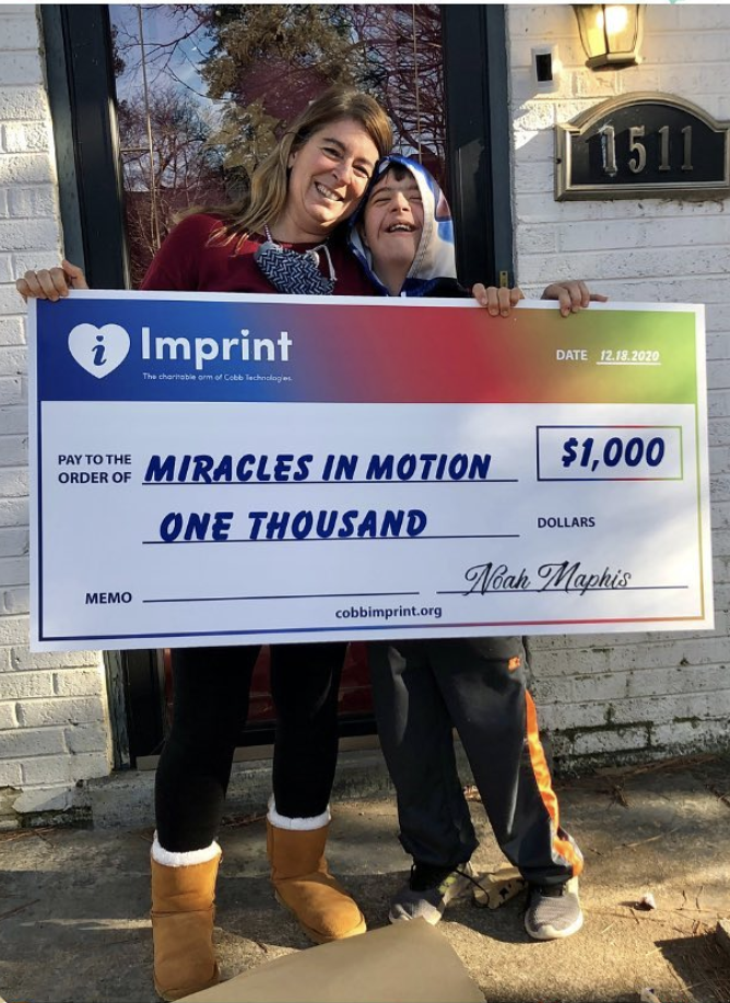 2020 Check presentation to Miracles in Motion