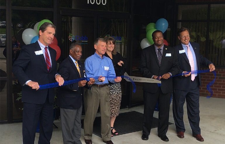 Cobb Cuts the Ribbon on New Headquarters